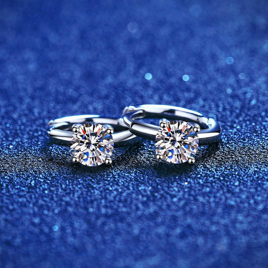 "Dazzle with every turn – a certified pair of 0.50 ct moissanite hoop earrings, masterfully set in 925 sterling silver for timeless elegance."